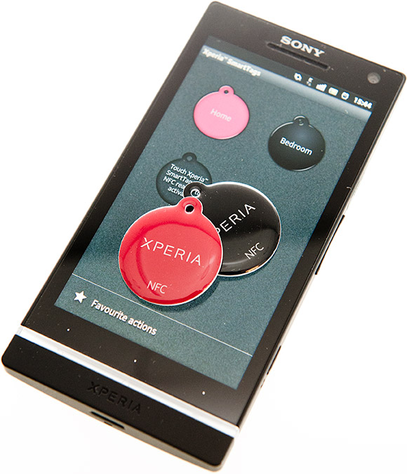 Black and red Xperia SmartTags on the Xperia S